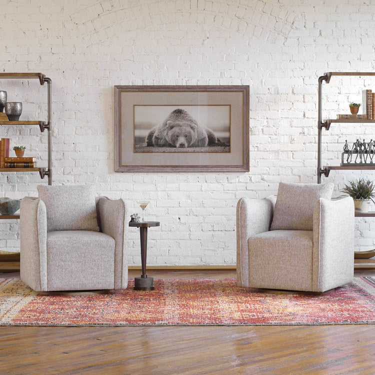 Uttermost Corben Stone Gray Linen Swivel Armchair - Image 1