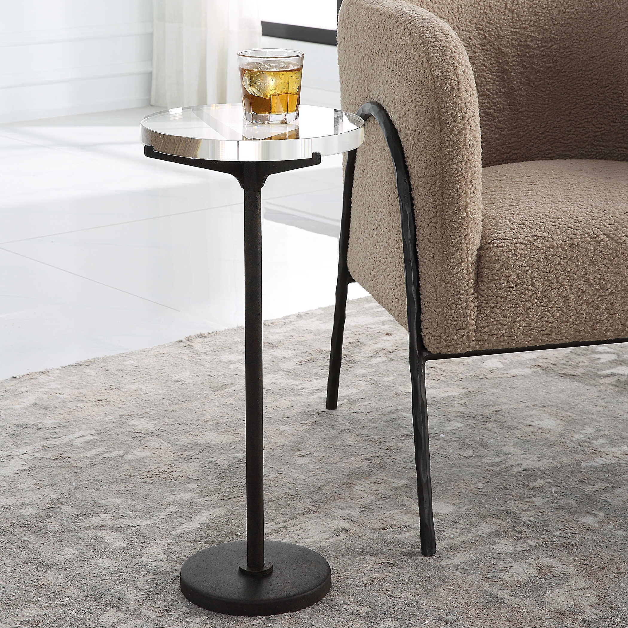 Uttermost Forge Modern Round Accent Table - Image 1