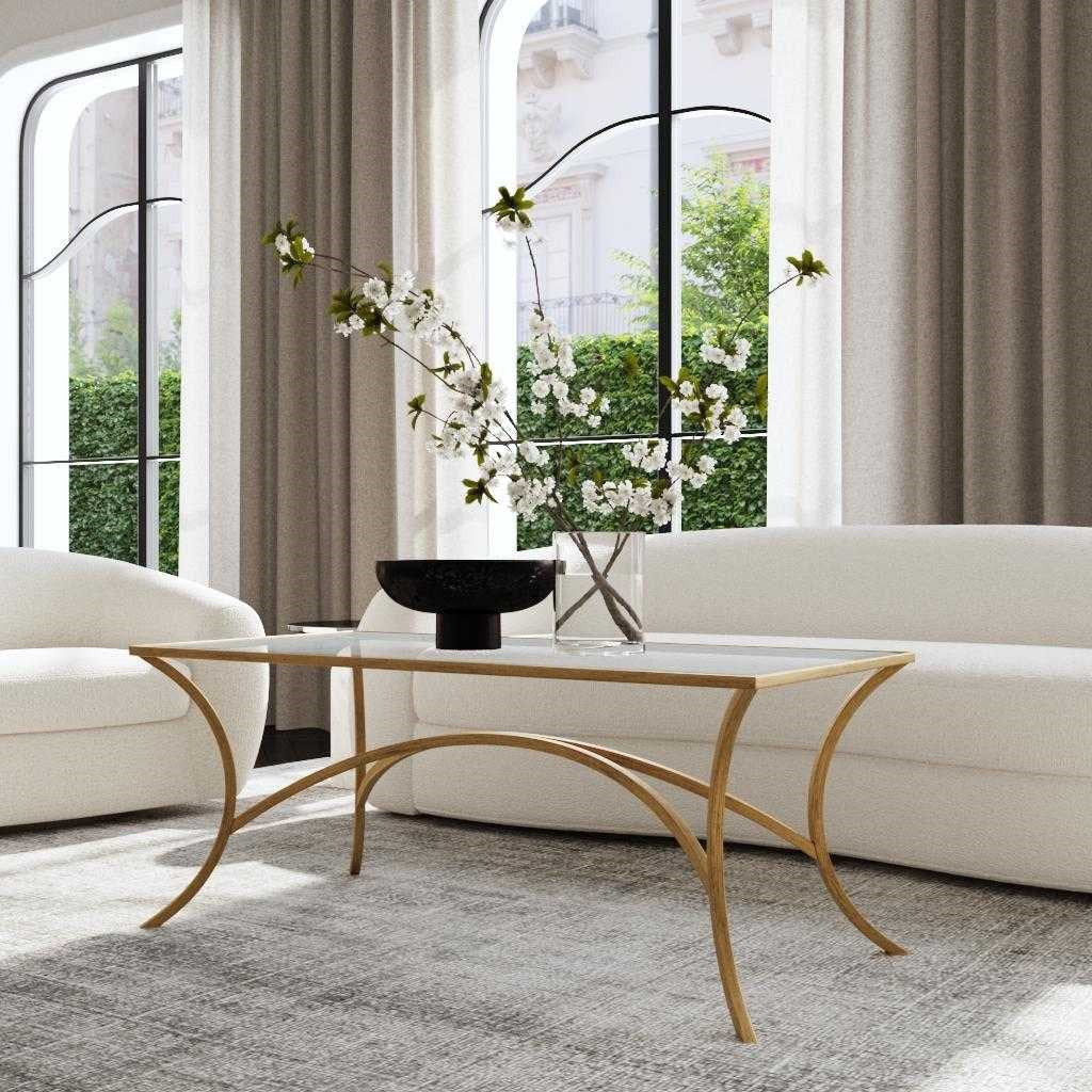 Uttermost Alayna Glass Top With Antiqued Gold Leaf Iron Base Coffee Table - Image 1