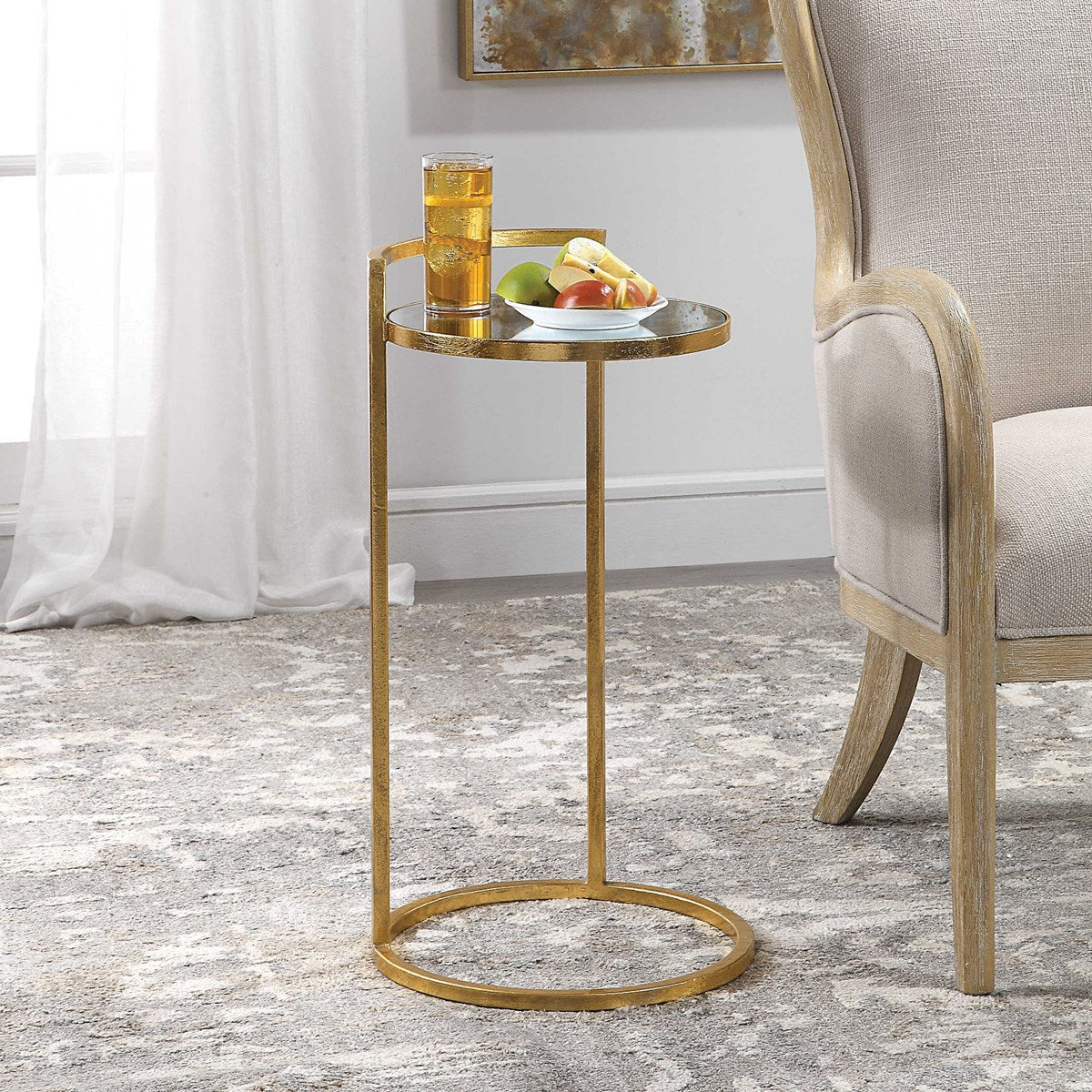 Uttermost Cailin Mirrored Top With Gold Leaf Iron Base Round Accent Table - Image 1