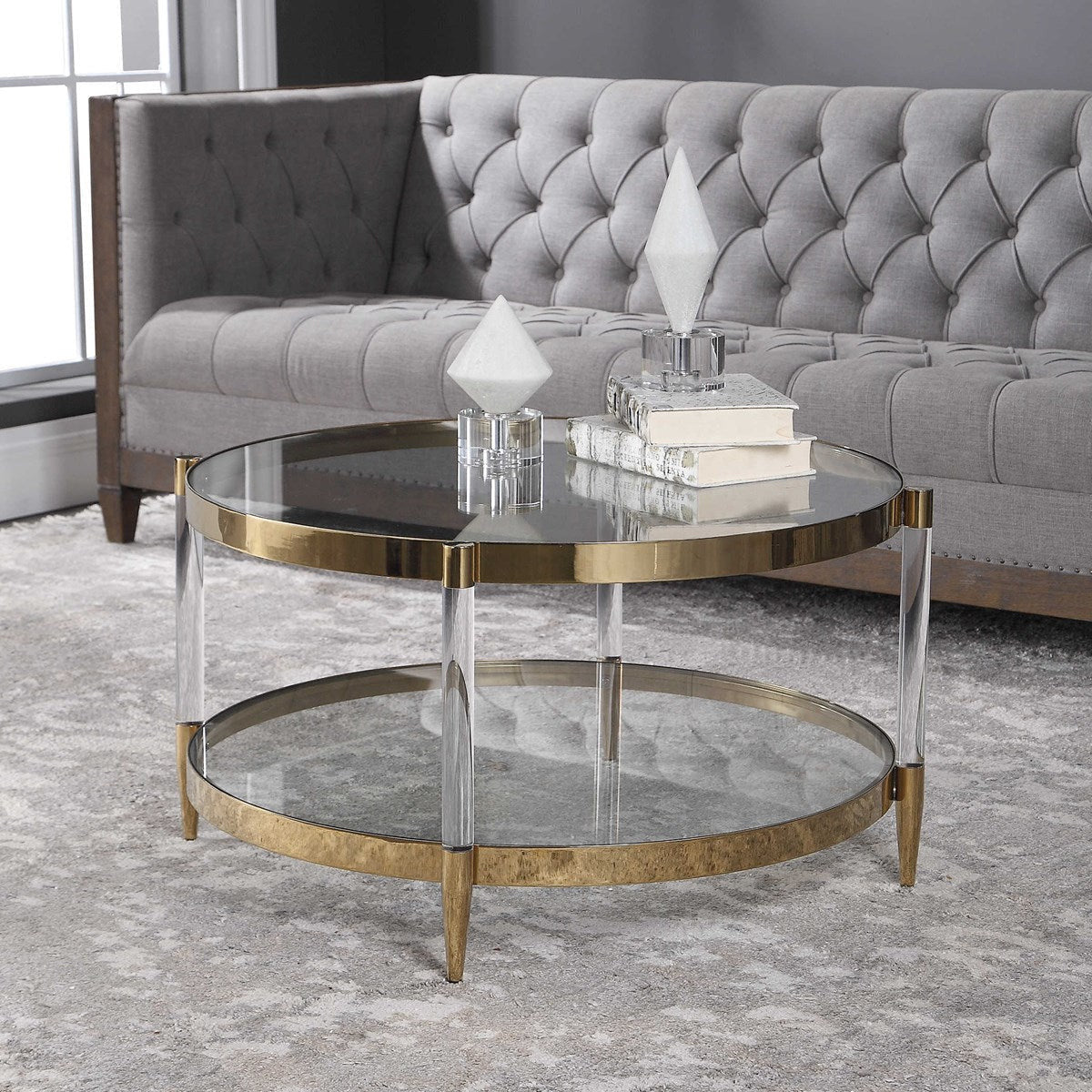 Uttermost Kellen Glass Too With Acrylic and Gold Base Round Coffee Table - Image 1