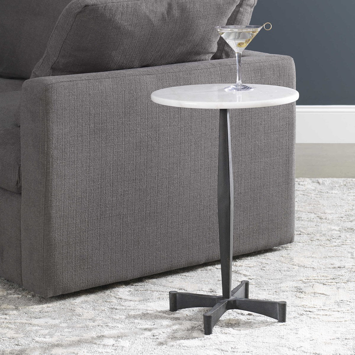 Uttermost Counteract White Marble Top With Black Steel Modern Round Accent Table - Image 1