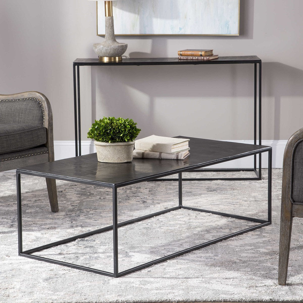 Uttermost Coreene Antiqued Bronze With Aged Black Iron Modern Coffee Table - Image 1