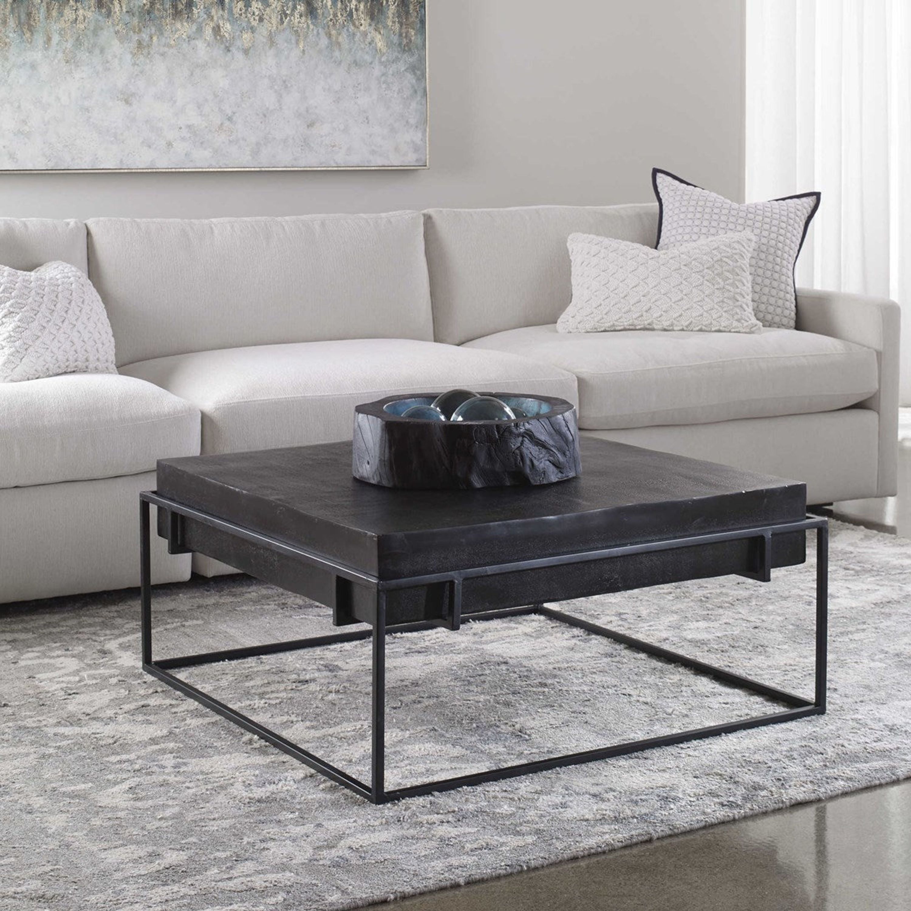 Uttermost Telone Antiqued Black Top With Aged Black Iron Base  Modern Coffee Table - Image 1