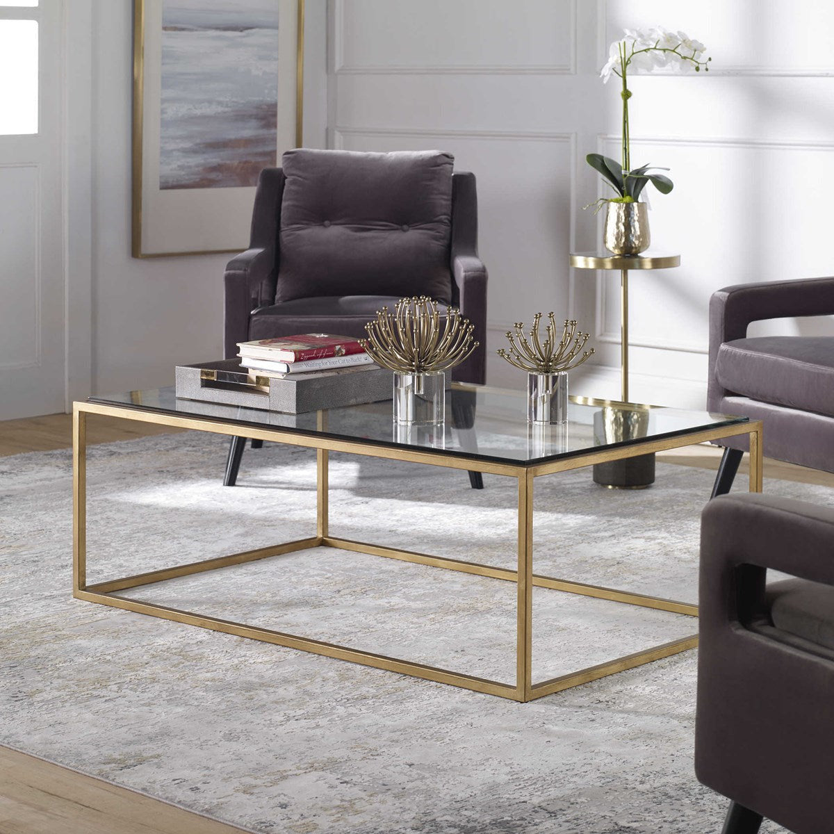 Uttermost Bravura Glass Top Brushed Gold Leaf Iron Base Coffee Table - Image 1