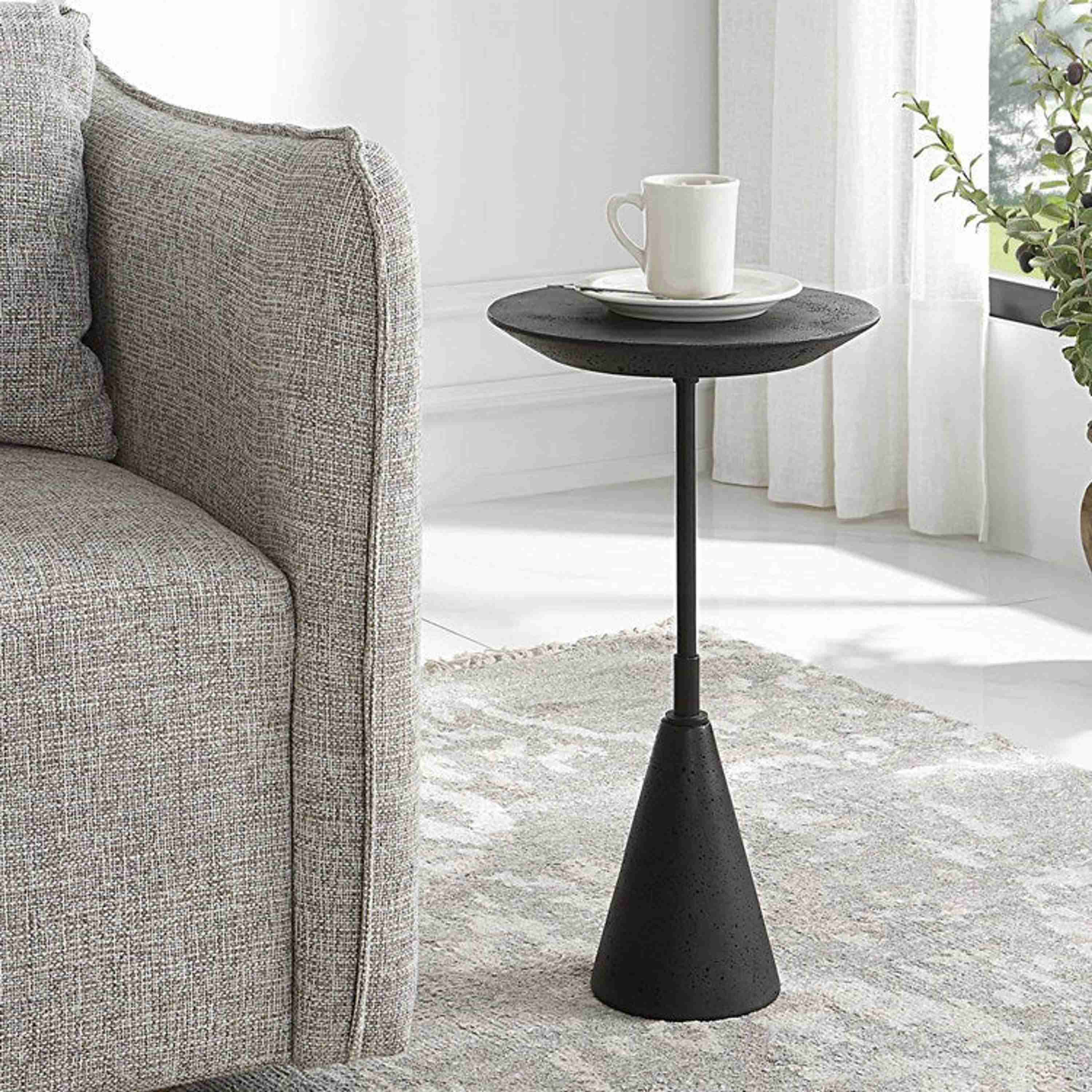 Uttermost Midnight Black Round Modern Accent Table - Image 1