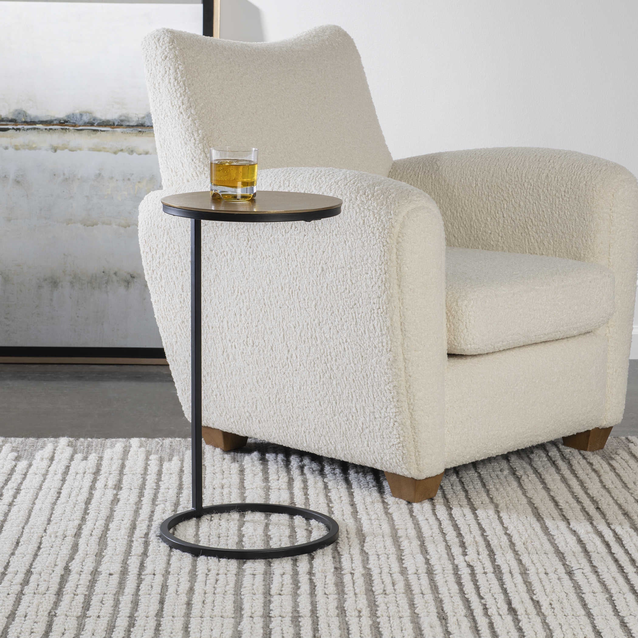 Uttermost Brunei Antiqued Gold Top With Aged Black Iron Base Modern Round Accent Table - Image 1