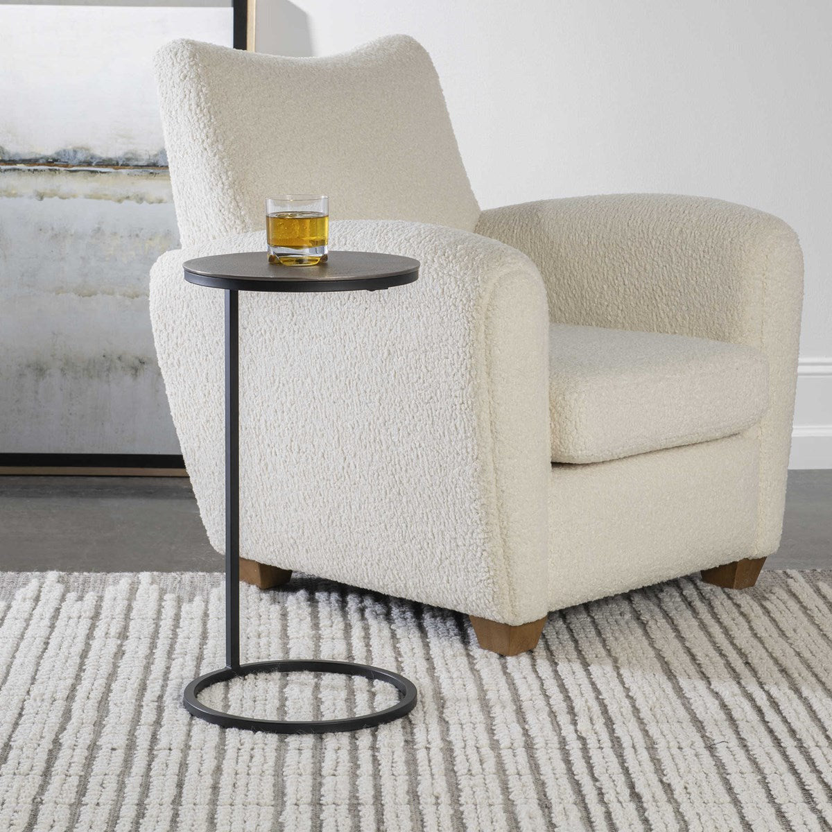 Uttermost Brunei Antiqued Nickel Top With Aged Black Iron Base Modern Round Accent Table - Image 1