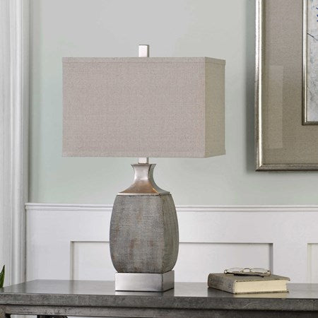 Uttermost Caffaro Textured Rust Bronze Ceramic Table Lamp With Light Beige Linen Shade - Image 1