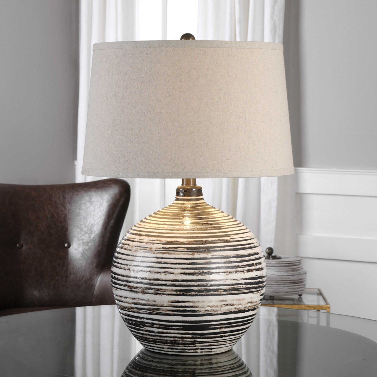 Uttermost Bloxom Dark Mocha Bronze Glazed Textured Ceramiv Table Lamp With Oatmeal Linen Shade - Image 1