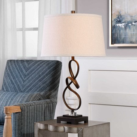 Uttermost Tenley Rubbed Bronze Table Lamp With Light Beige Linen Shade - Image 1