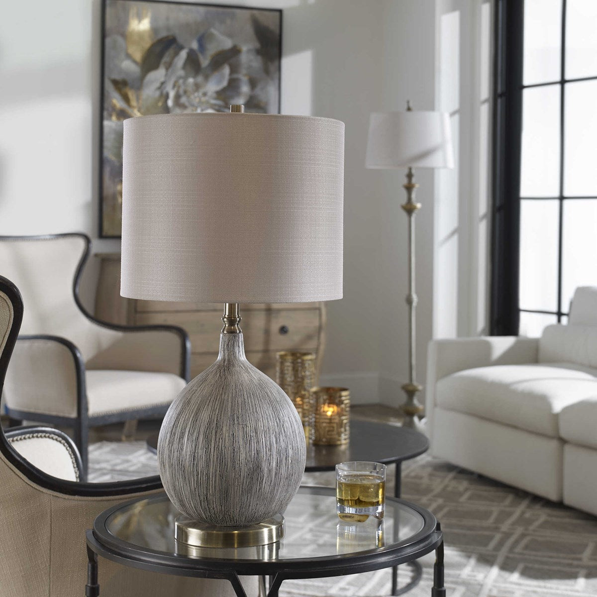 Uttermost Hedera Ivory and Aged Black Ceramic Table Lamp With Light Beige Linen Shade - Image 1