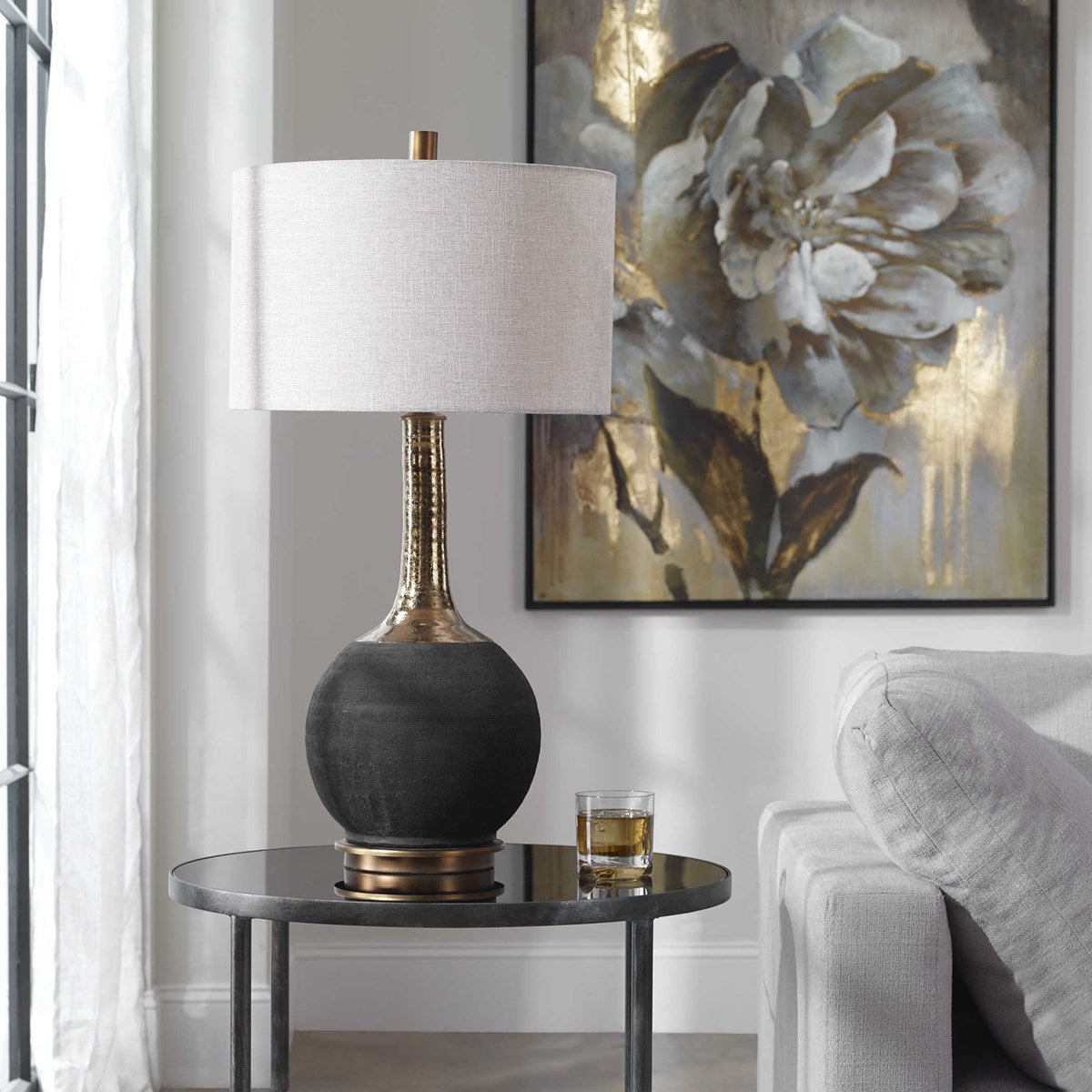 Uttermost Arnav Matte Black and Golden Bronze Table Lamp With Light Gray Linen Drum Shade - Image 2