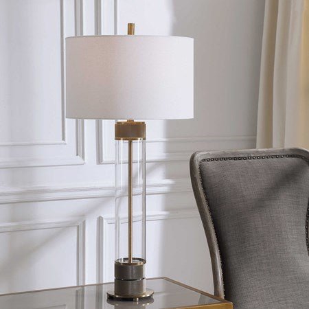 Uttermost Anmer Clear Glass and Antiqued Brass Iron Table Lamp With White Drum Shade - Image 1