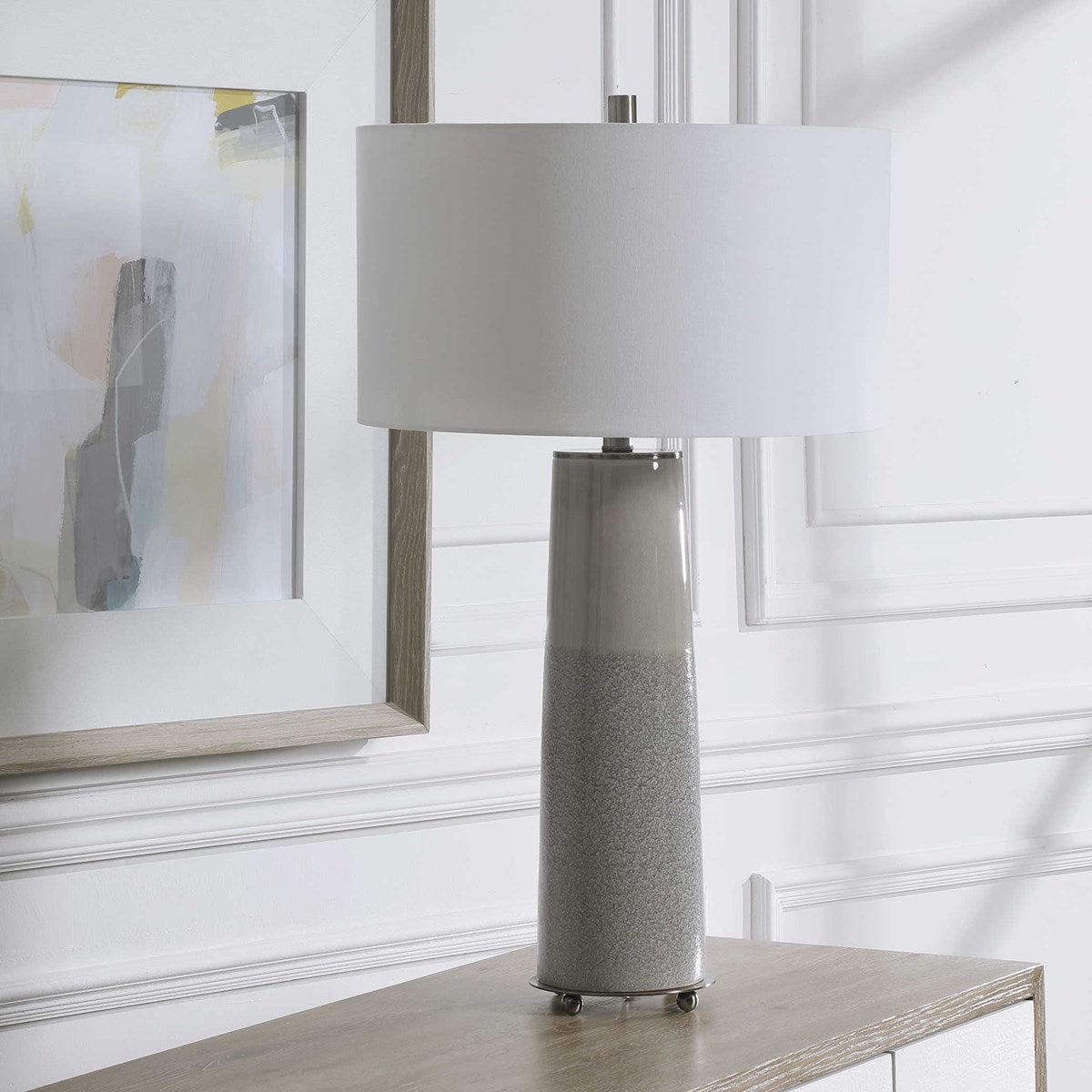 Uttermost Abdel Light Gray Glaze Ceramic Table Lamp Wth Off White Drum Shade - Image 1