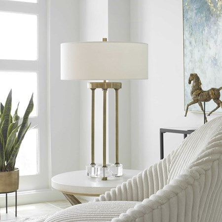 Uttermost Pantheon Antiqued Brass Iron Table Lamp With White Linen Shade - Image 1