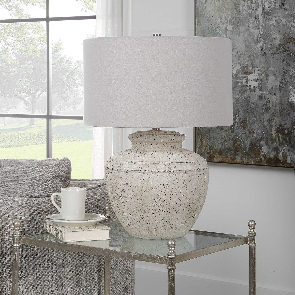 Uttermost Artifact  Aged Stone Ceramic Table Lamp With Light Gray Linen Drum Shade - Image 1