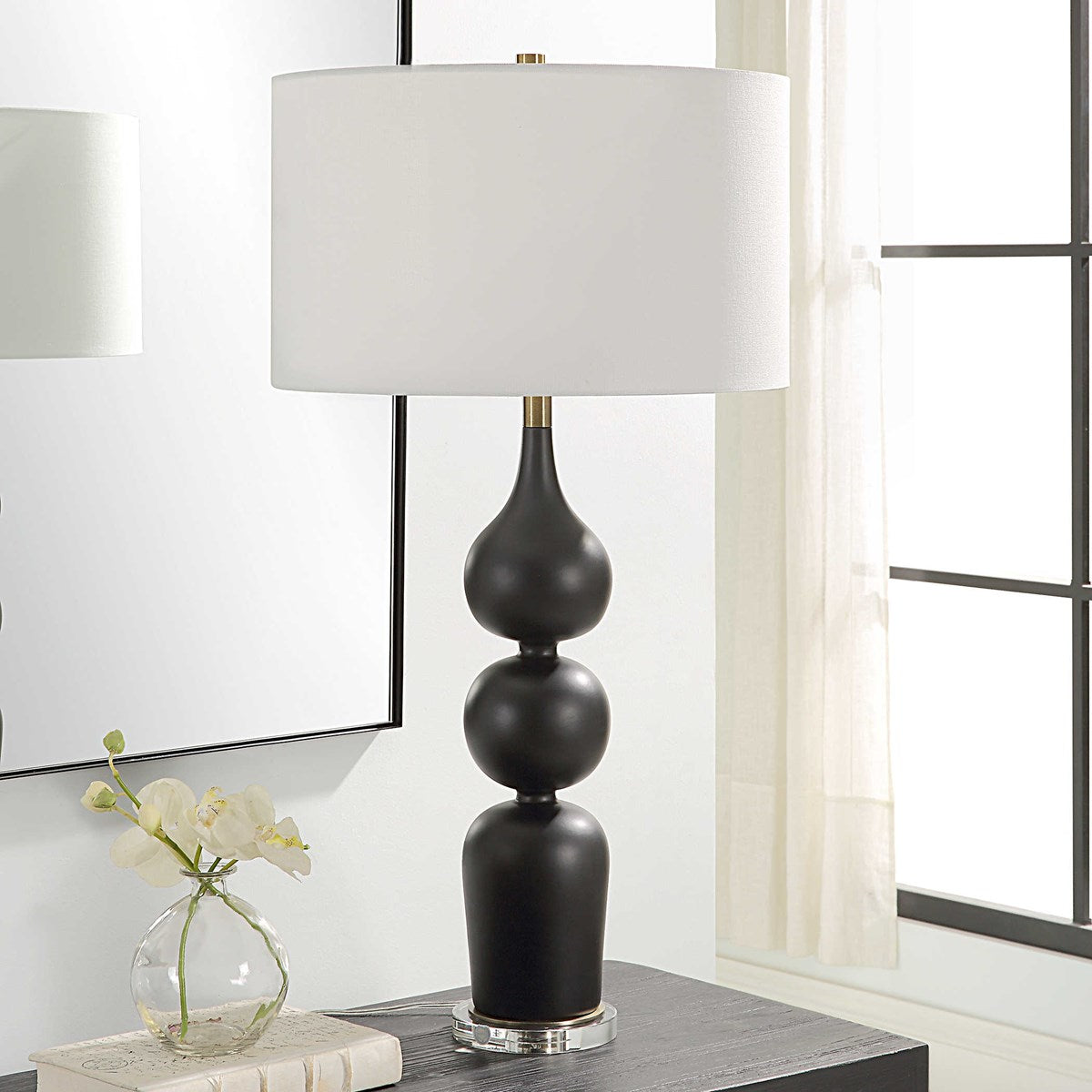 Uttermost Caviar Matte Black Glazed Ceramic Table Lamp With White Linen Shade - Image 1