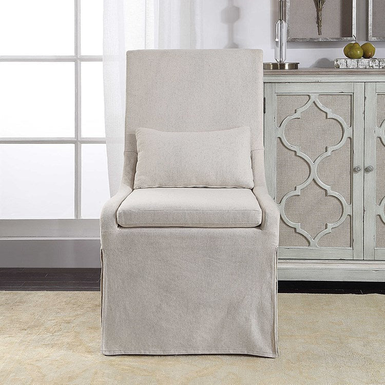 Uttermost Coley Off-White Linen Performance Fabric Slipcovered Armless Chair With Pillow - Image 1