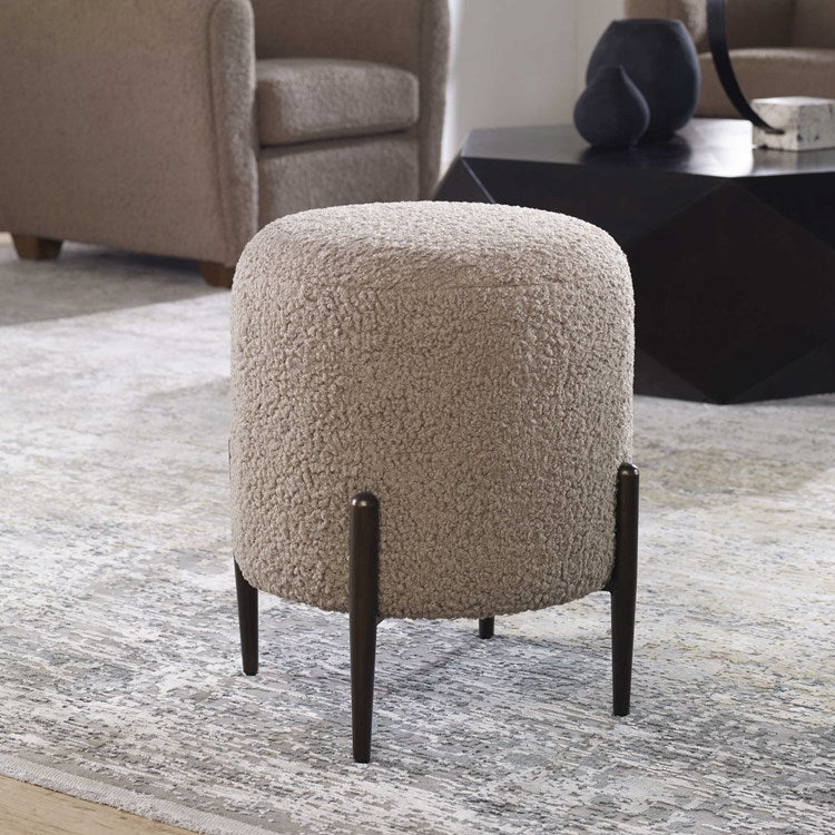 Uttermost Arles Latte Faux Shearling Round Ottoman - Image 1