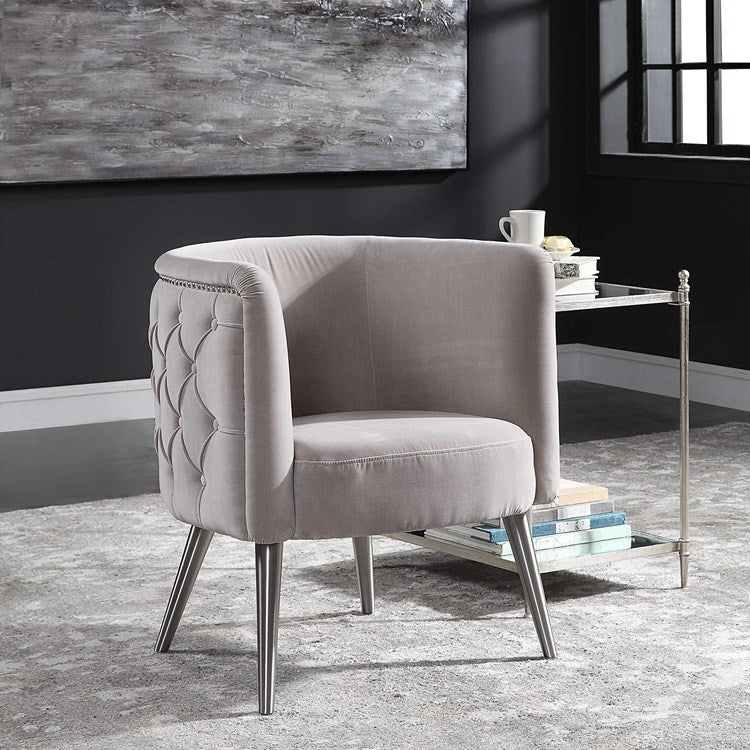 Uttermost Haider Champagne Velvet Tufted Back Barrel Accent Chair - Image 1