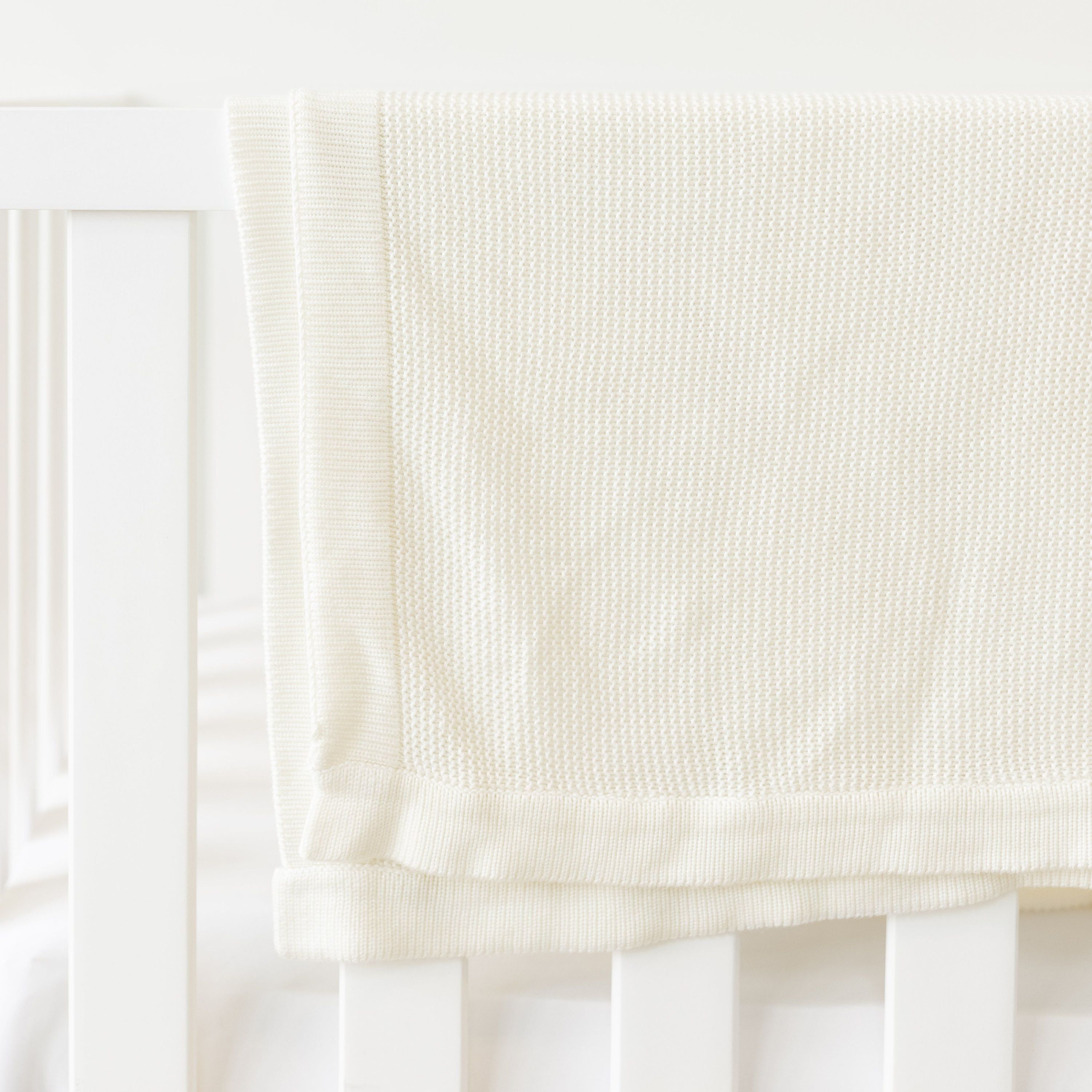 Cozy Earth Cloud Knit Baby Blanket Available in Ivory and White - Image 2