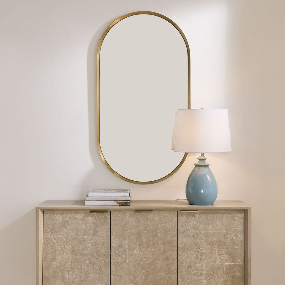 Uttermost Torrado Oval Antique Brass Mirror - Image 1