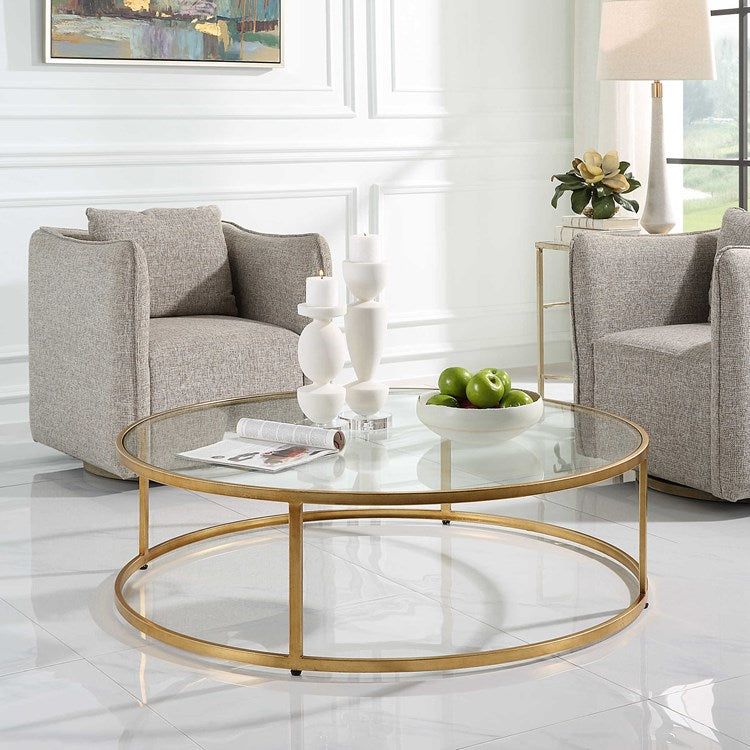 Uttermost Radius Glass Top with Antiqued Gold Iron Round Coffee Table - Image 1