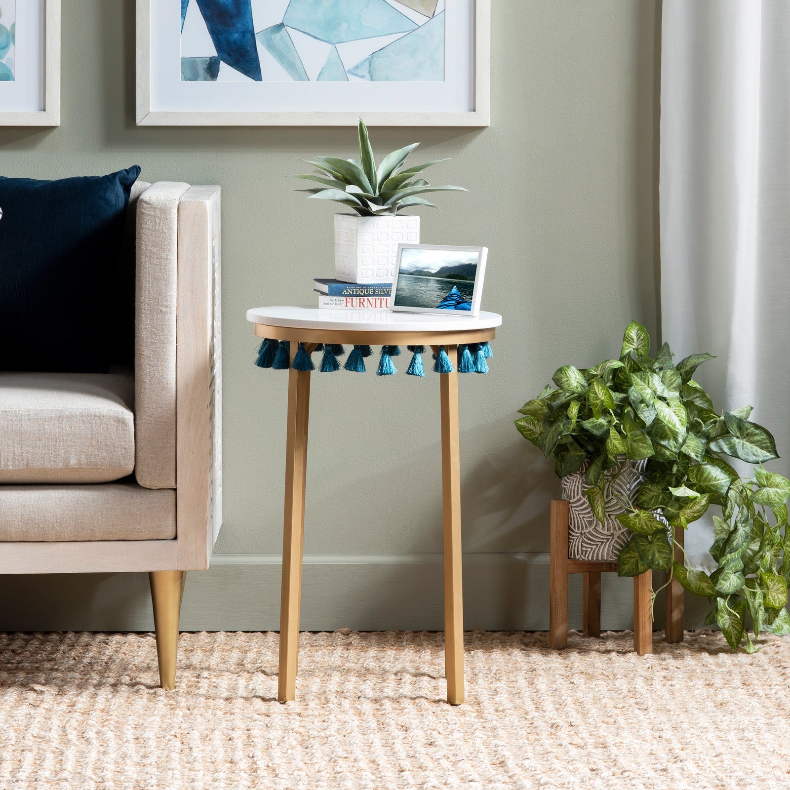 Crestview Collection Saffron Round Marble Accent Table With Teal Blue Tassels - Image 1