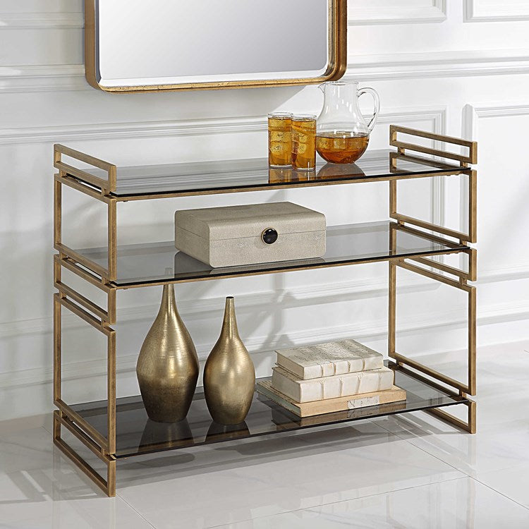 Uttermost Stacked Up Smoked Gray Glass Shelves with Antiqued Gold Iron Contemporary Console Table - Image 1