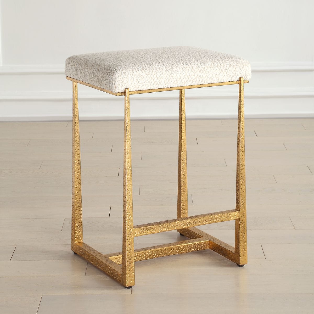 Uttermost Midas Antiqued Gold Iron Counter Stool With Cushioned Seat - Image 1