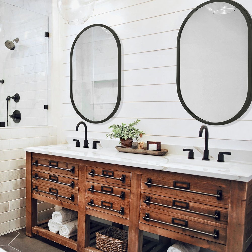 Casa Bella Living Matte Black Framed Oval Shaped Mirror - Image 1