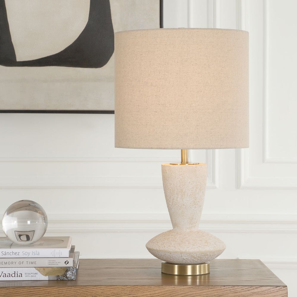 Uttermost Doreyn Ivory Ceramic Base Table Lamp With Light Beige Linen Shade - Image 1