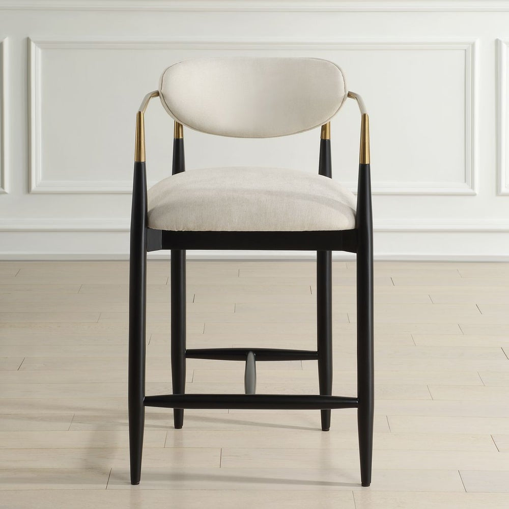 Uttermost Moxie Off-White Velvet Counter Stool With Matte Black Wood and Brushed Brass Frame - Image 1