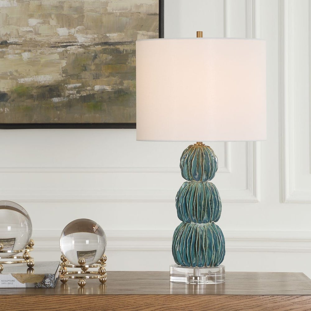 Uttermost Bonaire Teal Blue Glazed Ceramic Table Lamp With White Linen Shade - Image 1
