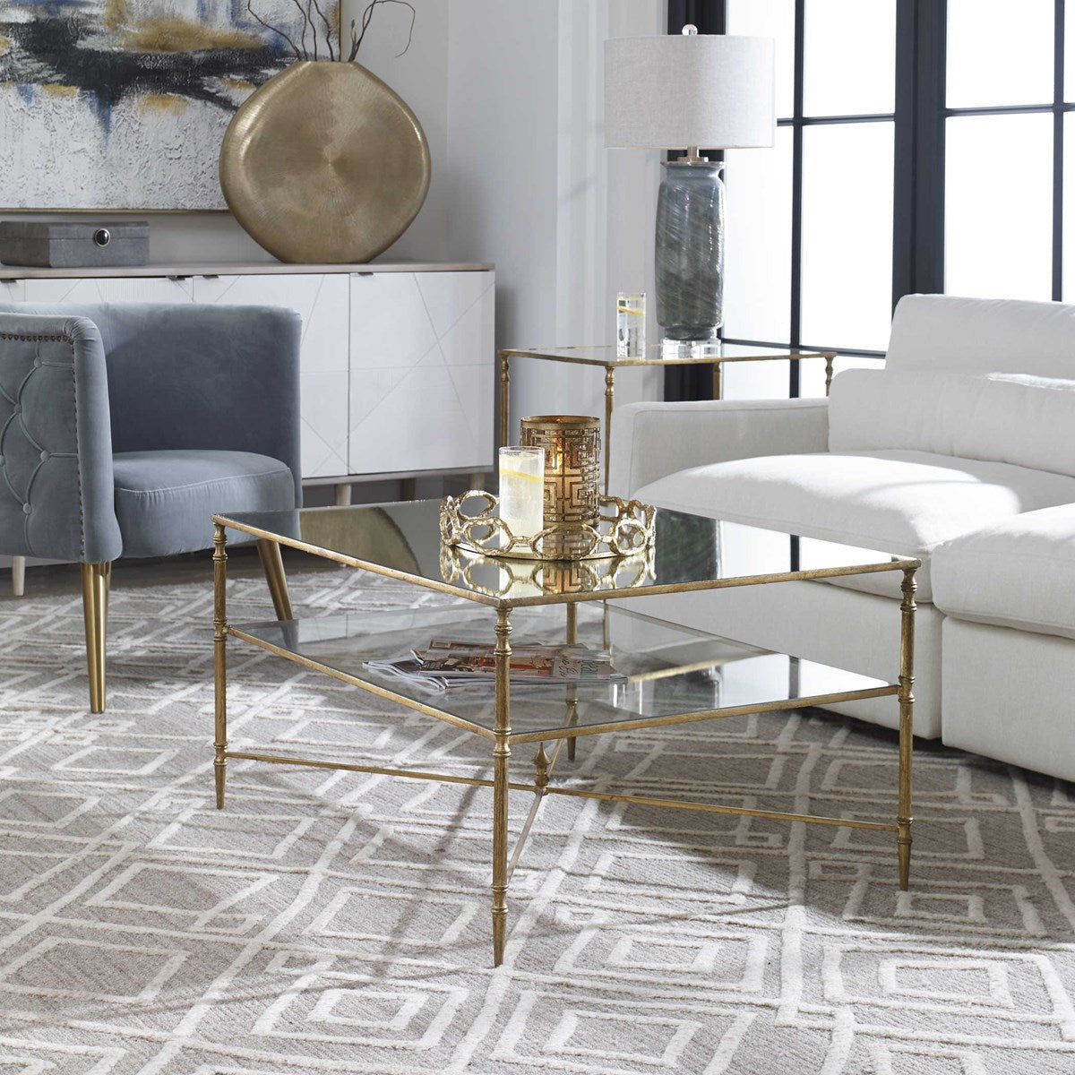 Uttermost Henzler Mirrored Top With Antiqued Gold Iron Coffee Table - Image 1
