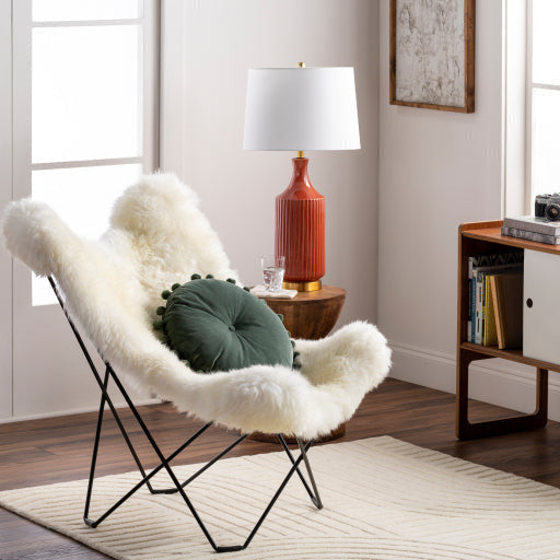 Surya Nizhoni Modern Ivory Sheepskin Sling Chair With Black Metal Legs - Image 1