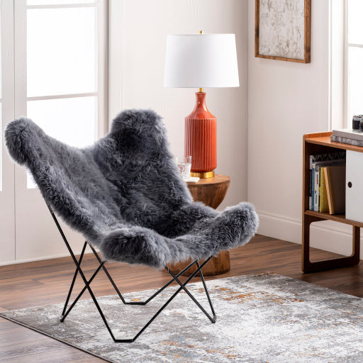 Surya Nizhoni Modern Charcoal Grey Sheepskin Sling Chair With Black Metal Legs - Image 1