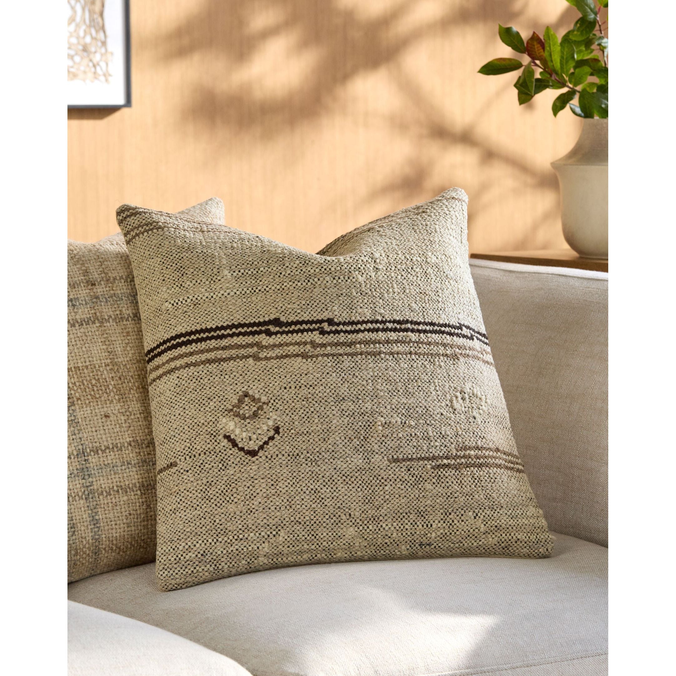Becki Owens x LIVABLISS Solea Pillow in Cream with Brown Tribal Designs - Image 1