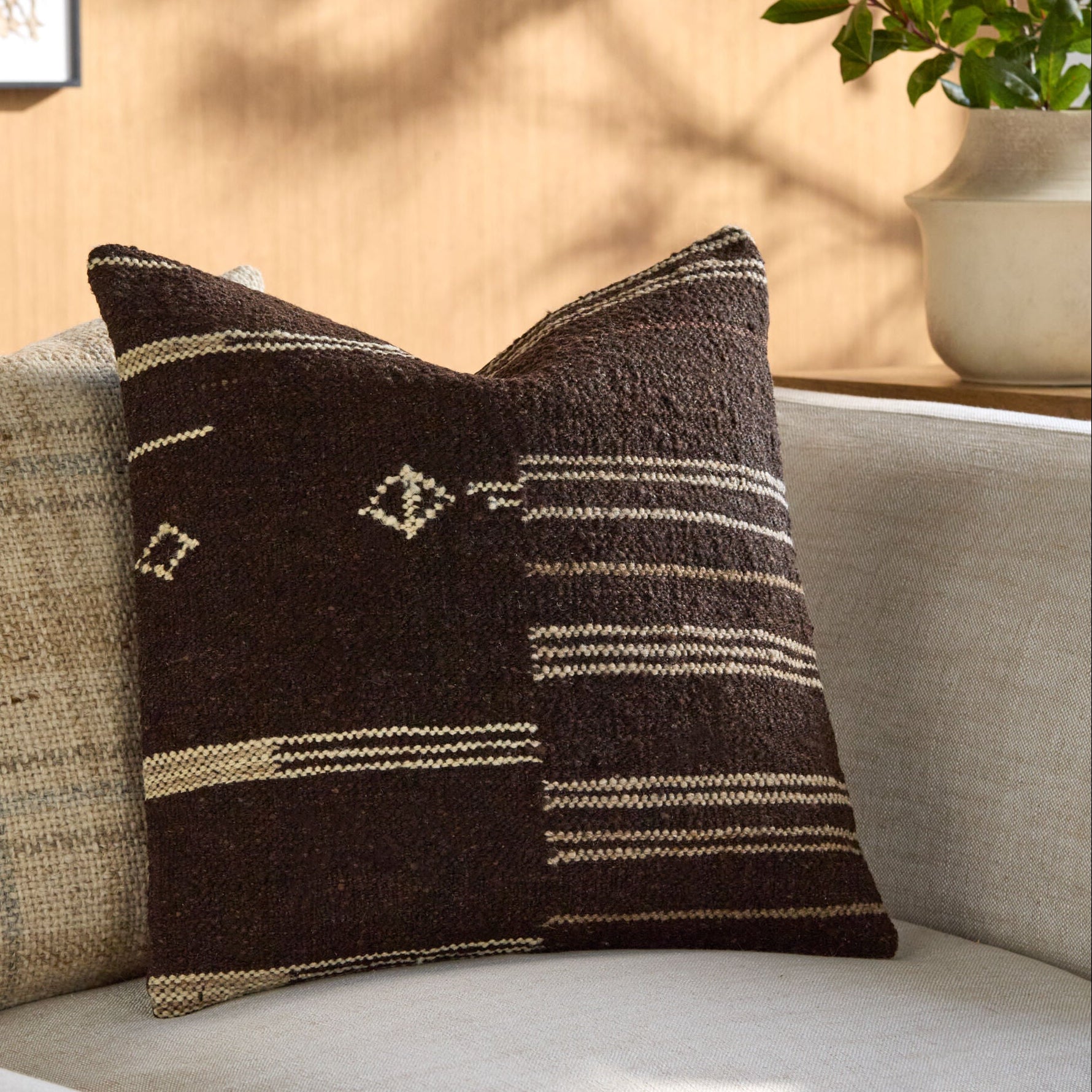 Becki Owens x LIVABLISS Solea Chocolate Pillow with Tribal Design - Image 1
