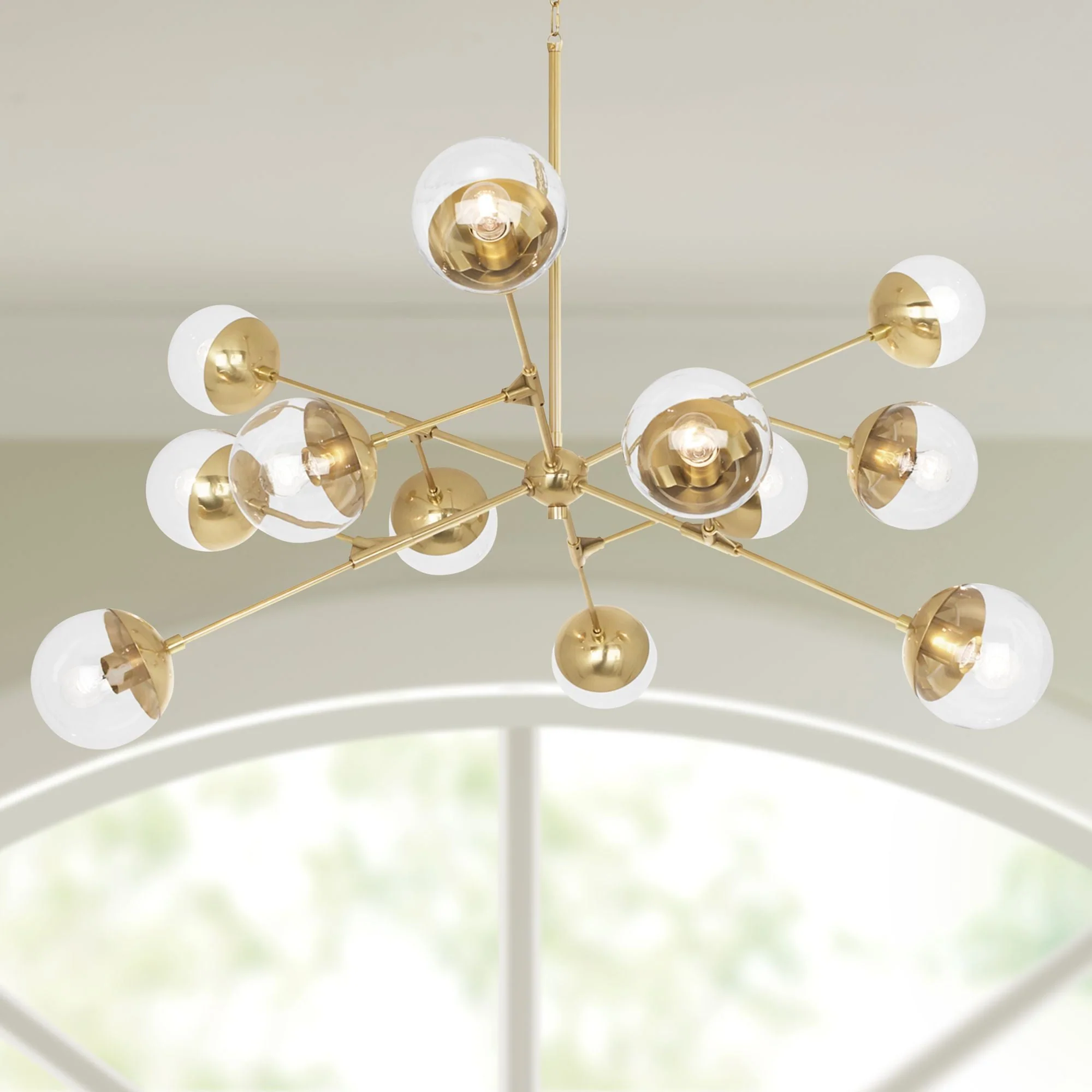 Robery Abbey Celeste 48" Wide Modern Brass Chandelier - Image 1